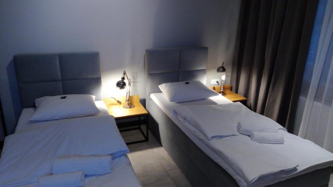 Apartsuites I Sorau Zary  Exterior photo A room at the hotel