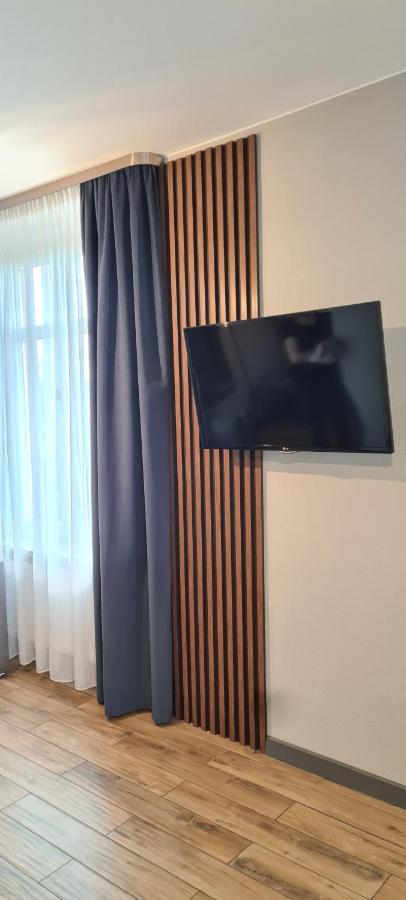 Apartsuites I Sorau Zary  Exterior photo A wall-mounted television