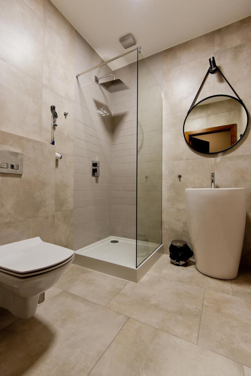 Apartsuites I Sorau Zary  Exterior photo A shower cubicle